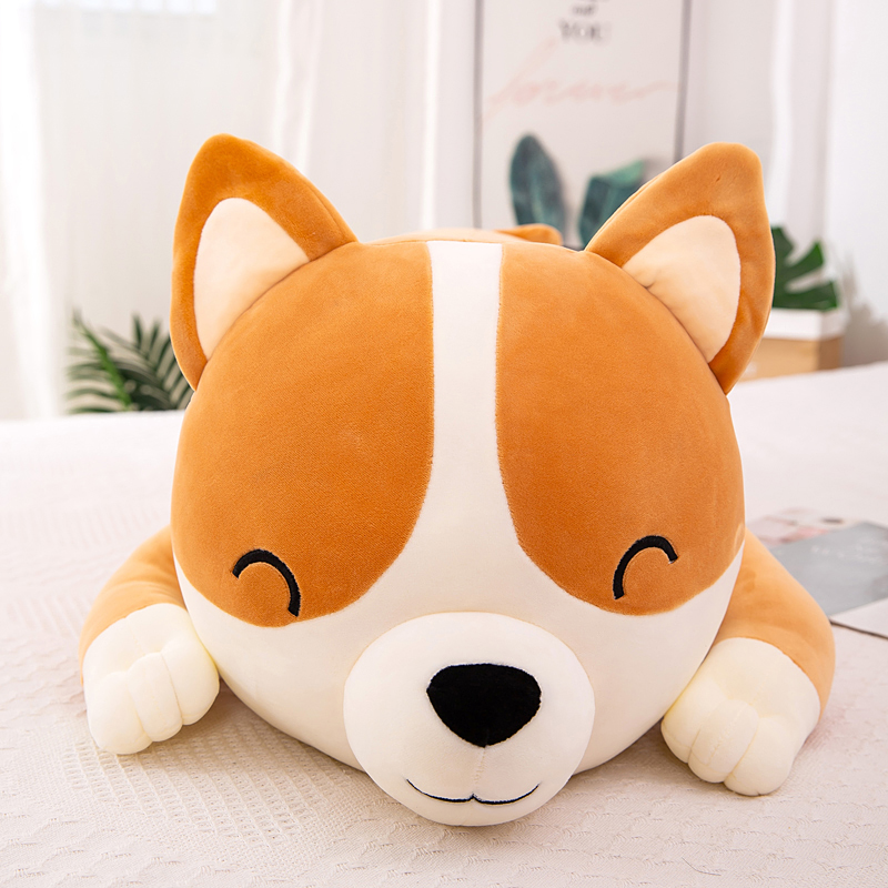  Close up of soft corgi plush face with closed eyes
